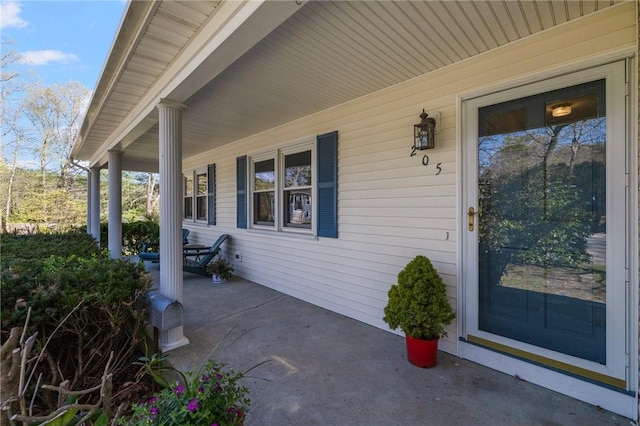 entrance to property with a porch