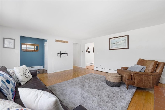 289 Oliphant Ln, Middletown, RI 02842 - living area featuring baseboards, a baseboard radiator, a baseboard heating unit, and hardwood / wood-style flooring