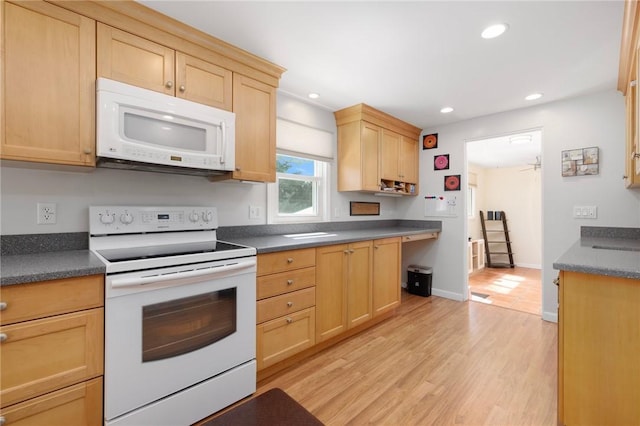289 Oliphant Ln, Middletown, RI 02842 - kitchen featuring light brown cabinetry, dark countertops, white appliances, light wood-style flooring, and recessed lighting