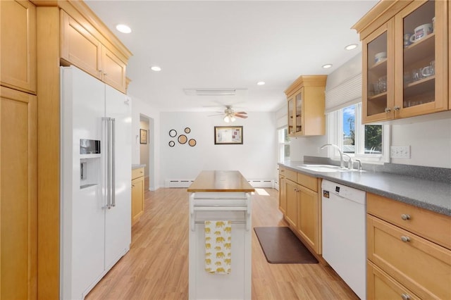 289 Oliphant Ln, Middletown, RI 02842 - kitchen featuring light wood-type flooring, a sink, a baseboard heating unit, and white appliances