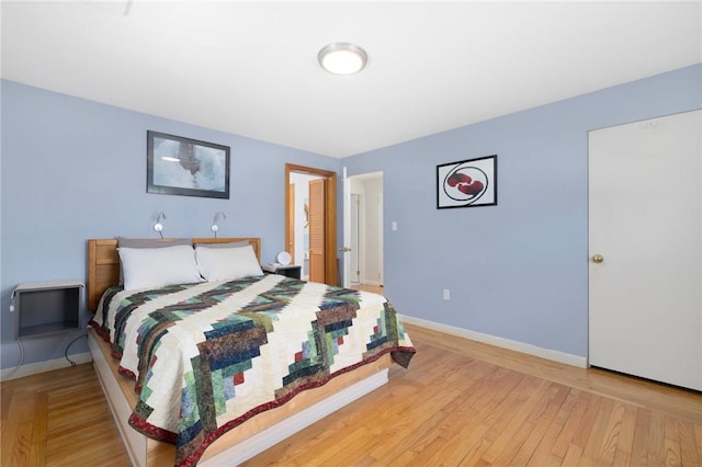 289 Oliphant Ln, Middletown, RI 02842 - bedroom with baseboards and light wood-type flooring