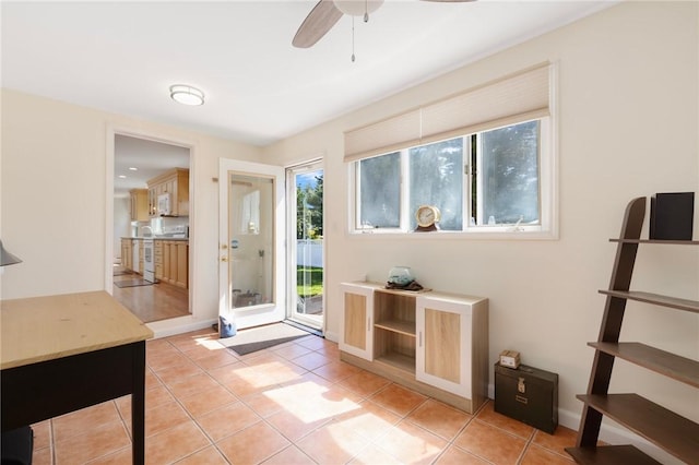 289 Oliphant Ln, Middletown, RI 02842 - doorway to outside with light tile patterned flooring and a ceiling fan