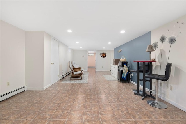 289 Oliphant Ln, Middletown, RI 02842 - living area with recessed lighting, baseboards, and a baseboard heating unit