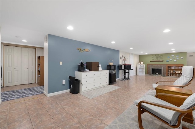 289 Oliphant Ln, Middletown, RI 02842 - living room with recessed lighting, baseboards, light tile patterned floors, and a fireplace