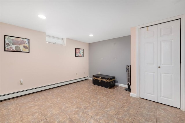 289 Oliphant Ln, Middletown, RI 02842 - below grade area featuring light tile patterned floors, baseboards, a baseboard radiator, and recessed lighting