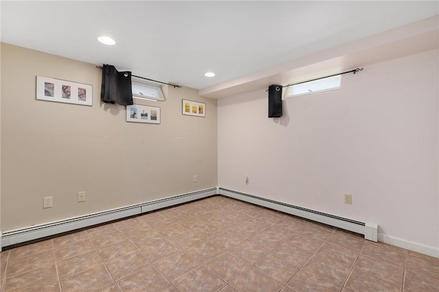 289 Oliphant Ln, Middletown, RI 02842 - below grade area with recessed lighting and a baseboard radiator