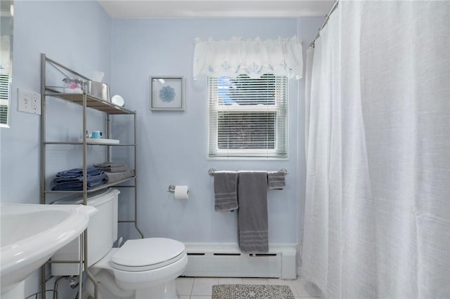 289 Oliphant Ln, Middletown, RI 02842 - bathroom with tile patterned flooring, toilet, a shower with shower curtain, a baseboard heating unit, and a sink