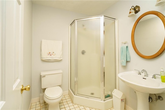 51 Scenic Dr, West Warwick, RI 02893 - bathroom featuring toilet, baseboards, tile patterned flooring, and a stall shower