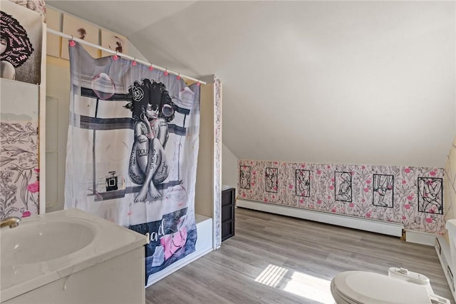 full bathroom with a shower with curtain, wood finished floors, vanity, a baseboard heating unit, and lofted ceiling