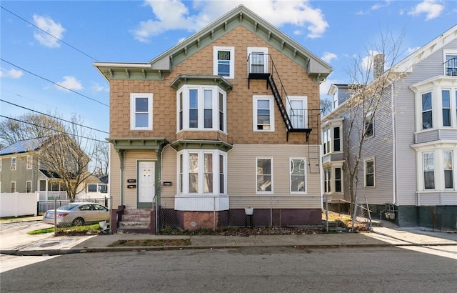 view of front of property with fence