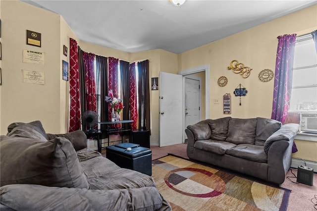 carpeted living area with cooling unit, baseboards, and a baseboard radiator