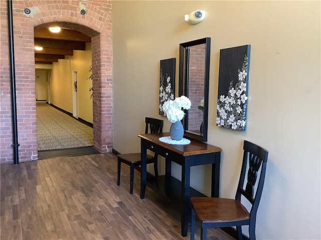 1 Tupperware Dr Unit 233, North Smithfield, RI 02896 - corridor with arched walkways, wood finished floors, beamed ceiling, and baseboards