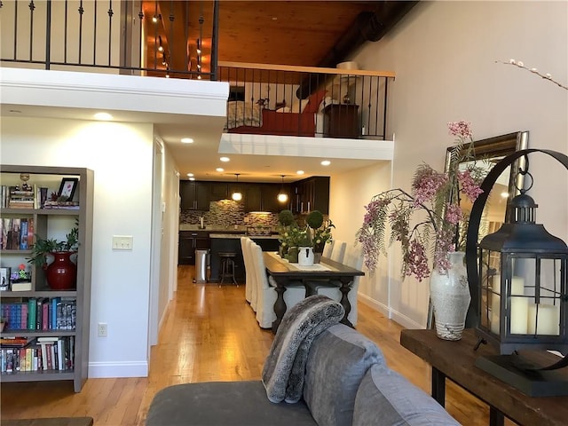 1 Tupperware Dr Unit 233, North Smithfield, RI 02896 - living area with light wood-type flooring and baseboards