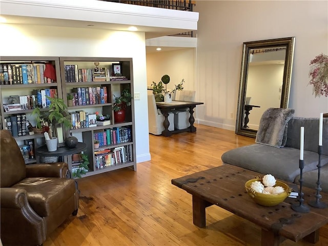1 Tupperware Dr Unit 233, North Smithfield, RI 02896 - living area with light wood finished floors and baseboards