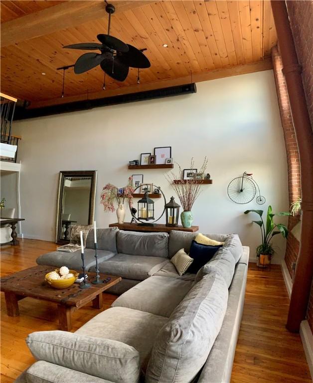 1 Tupperware Dr Unit 233, North Smithfield, RI 02896 - living area featuring wooden ceiling, wood finished floors, and a ceiling fan