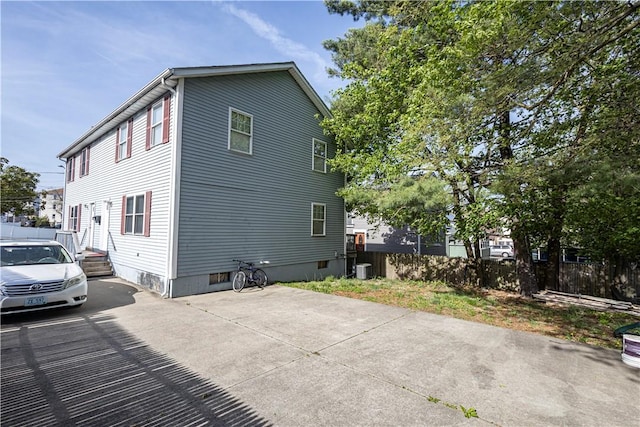 33 Dome St Unit A, Providence, RI 02908 - view of property exterior with fence and cooling unit