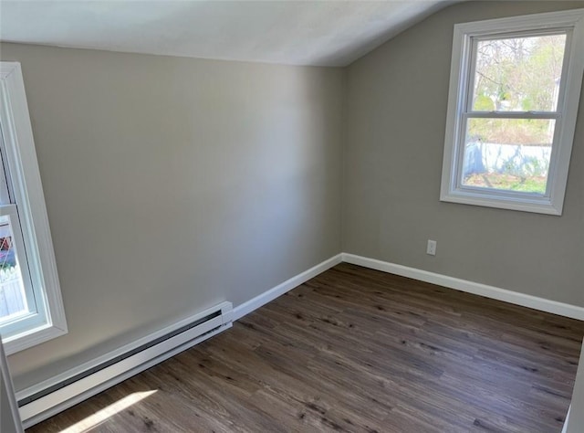 191 Canfield Ave, Warwick, RI 02889 - additional living space with baseboard heating, dark wood-style floors, baseboards, and lofted ceiling