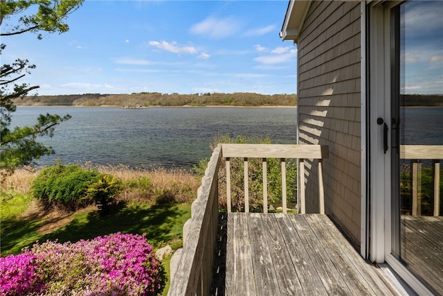 exterior space with a water view