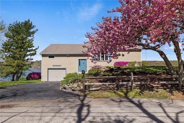 view of front of property with an attached garage and driveway