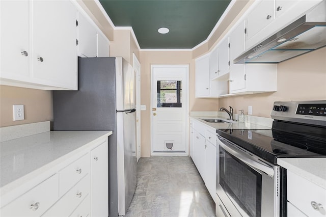 kitchen with a sink, white cabinets, stainless steel appliances, and under cabinet range hood