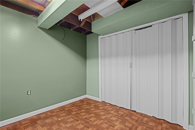 finished basement featuring baseboards