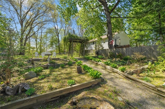 view of yard featuring fence