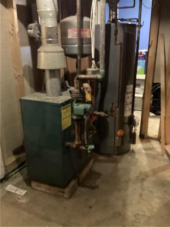 446 Carrington Ave, Woonsocket, RI 02895 - utility room featuring a heating unit and water heater