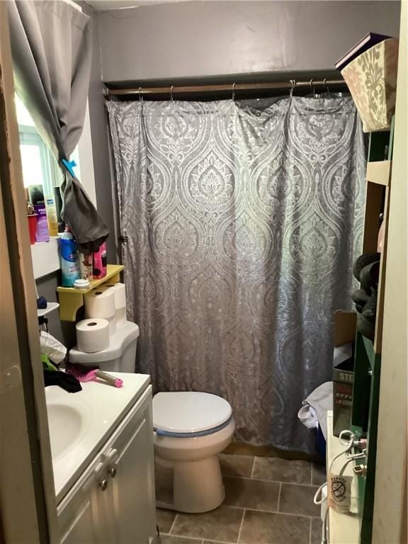 446 Carrington Ave, Woonsocket, RI 02895 - bathroom with vanity, tile patterned flooring, toilet, and a shower with shower curtain