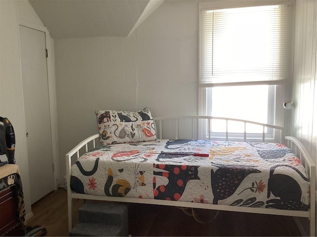 446 Carrington Ave, Woonsocket, RI 02895 - bedroom with vaulted ceiling and wood finished floors