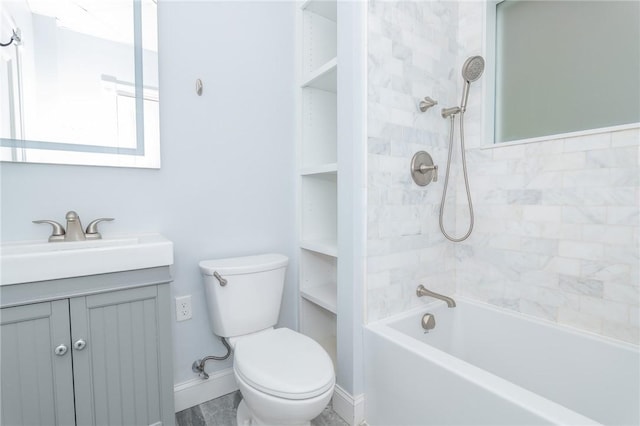 bathroom featuring vanity, shower / bathing tub combination, baseboards, and toilet