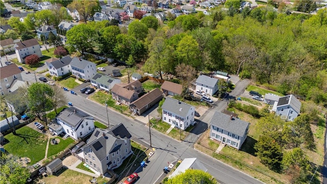 birds eye view of property with a residential view