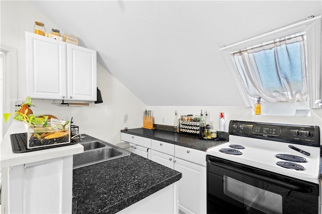 kitchen with dark countertops, vaulted ceiling, black range with electric stovetop, a sink, and white cabinets