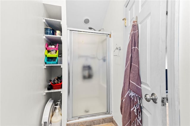 full bathroom featuring a shower stall