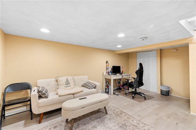 office area featuring recessed lighting, baseboards, and wood finished floors