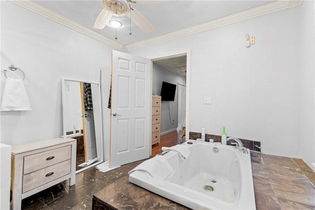 bathroom with a jetted tub, ceiling fan, and ornamental molding