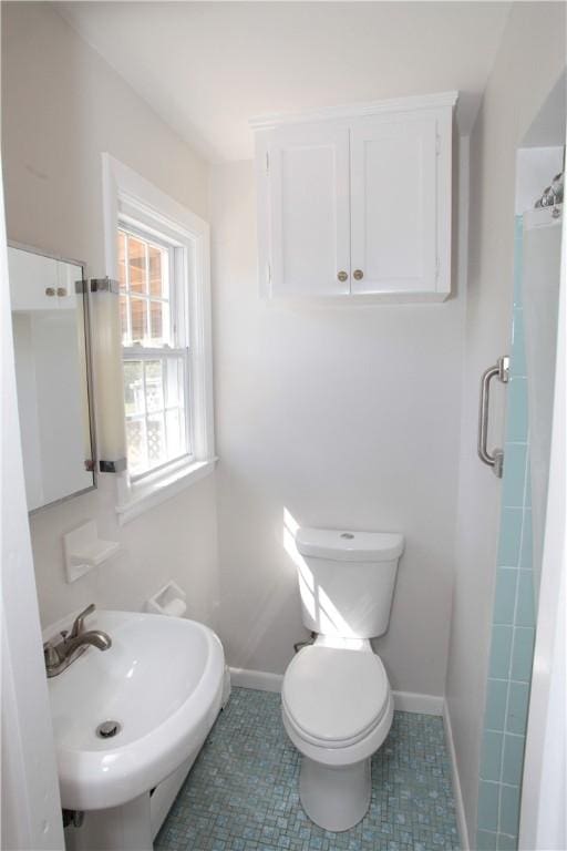 7 Smithfield Dr, Middletown, RI 02842 - bathroom featuring toilet, baseboards, a sink, and tile patterned floors