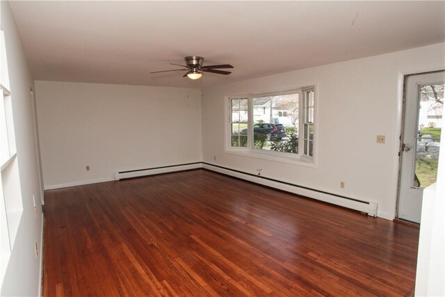7 Smithfield Dr, Middletown, RI 02842 - unfurnished room with ceiling fan, baseboard heating, wood finished floors, and a wealth of natural light