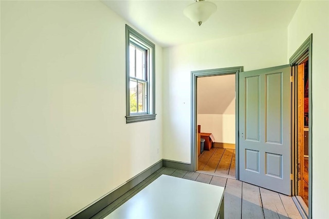 hallway featuring light tile patterned floors