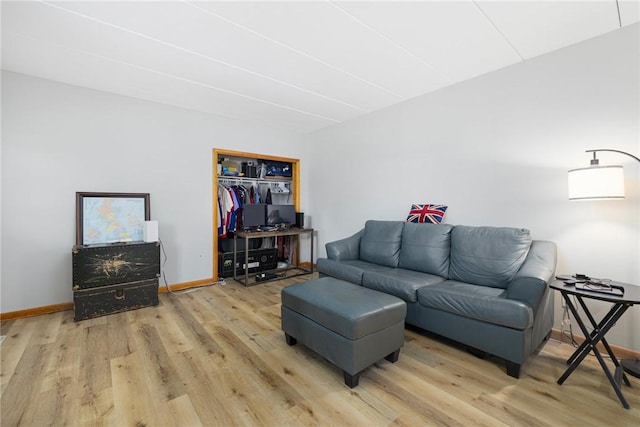 94 Cowesett Ave Unit 1, West Warwick, RI 02893 - living room featuring baseboards and light wood-style flooring