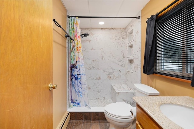 94 Cowesett Ave Unit 1, West Warwick, RI 02893 - bathroom featuring vanity, toilet, tiled shower, recessed lighting, and a baseboard radiator