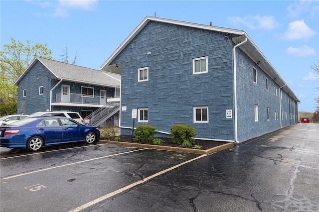 94 Cowesett Ave Unit 1, West Warwick, RI 02893 - exterior space featuring stairs and uncovered parking