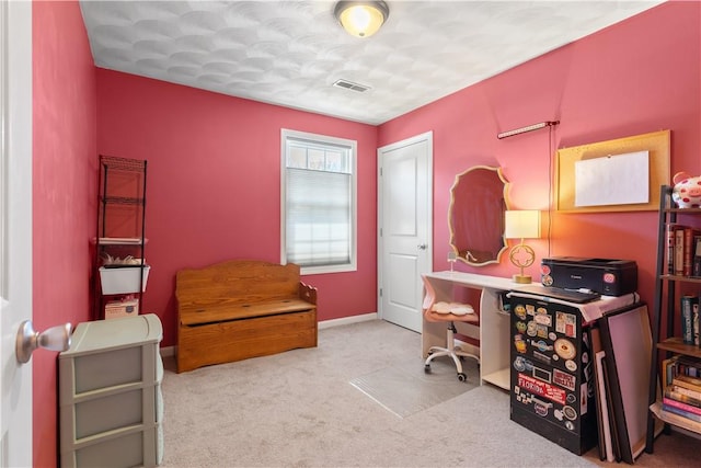 carpeted office space with visible vents