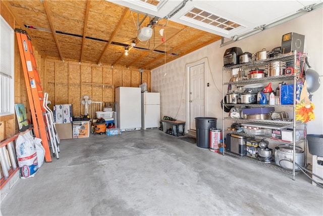 garage featuring freestanding refrigerator