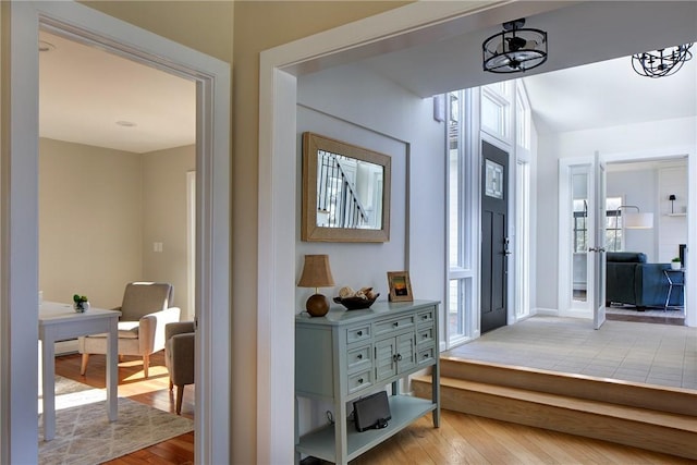 corridor featuring light wood-style floors