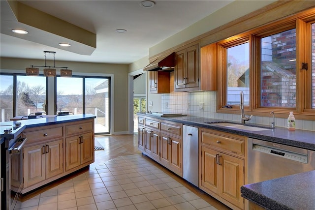 kitchen featuring appliances with stainless steel finishes, a sink, recessed lighting, light tile patterned floors, and range hood