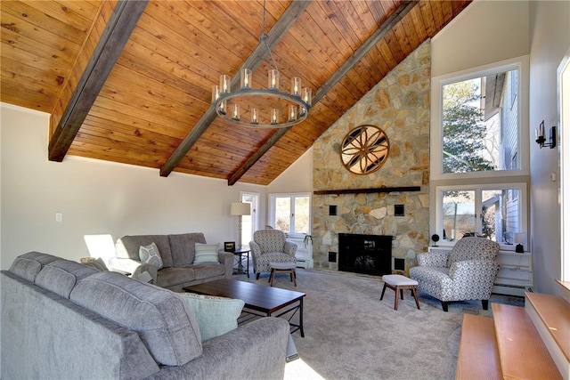 carpeted living area with wooden ceiling, high vaulted ceiling, beam ceiling, and a notable chandelier