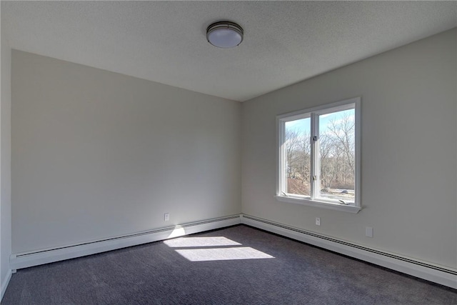 empty room with a baseboard radiator and dark carpet
