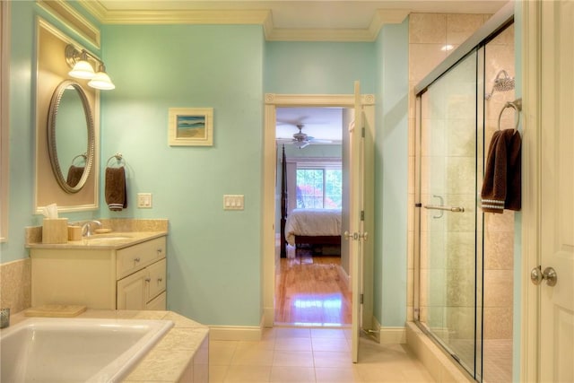 ensuite bathroom featuring ensuite bathroom, a garden tub, a stall shower, tile patterned floors, and ornamental molding