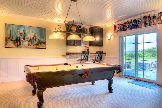 playroom featuring crown molding, wainscoting, pool table, and light carpet