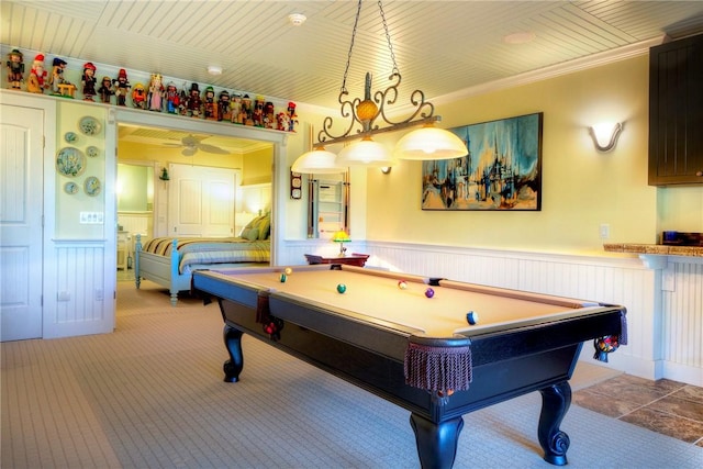 game room with crown molding, a ceiling fan, wainscoting, and billiards